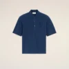 Ami de Coeur Polo en coton bleu avec écusson en tricot