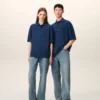 Ami de Coeur Polo en coton bleu avec écusson en tricot