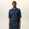 Ami de Coeur Polo en coton bleu avec écusson en tricot