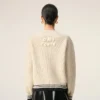 Ami de Coeur Sweater à col en V en laine côtelée blanche