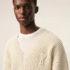 Ami de Coeur Sweater à col en V en laine côtelée blanche