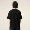 Ami de Coeur T-Shirt noir en coton avec inscription « Ami de Coeur » en relief