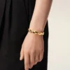 Bracelet tressé en laiton doré