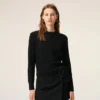 Cardigan à col rond en laine noire avec motif « Ami de Coeur » contrasté