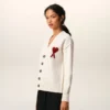 Cardigan en laine naturelle avec motif Ami de Coeur contrasté