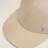 Casquette Ami de Coeur en nylon beige à clous
