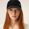 Casquette Ami de Coeur en nylon noir à clous