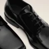 Chaussures derbies en cuir de vache noir