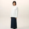 Chemise ajustée à col pointu en coton blanc