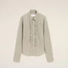 Chemise ajustée à manches longues en coton beige à volants