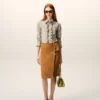 Chemise ajustée à manches longues en coton beige à volants