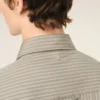 Chemise ajustée à manches longues en coton beige à volants