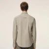 Chemise ajustée à manches longues en coton beige à volants