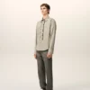 Chemise ajustée à manches longues en coton beige à volants