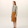 Chemise ajustée à manches longues en coton beige à volants