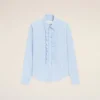 Chemise ajustée à manches longues en coton bleu à volants