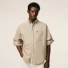 Chemise Ami de Coeur en coton beige, coupe carrée et brodée