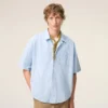 Chemise Ami de Coeur à manches courtes en coton bleu, coupe carrée