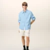 Chemise ample Ami de Coeur à col pointu en coton bleu
