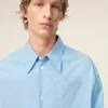 Chemise ample Ami de Coeur à col pointu en coton bleu