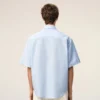 Chemise carrée en coton bleu brodée « Ami de Coeur »