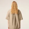 Chemise large à manches courtes et col camp en coton beige