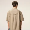 Chemise large à manches courtes et col camp en coton beige