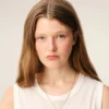 Collier avec pendentif « 0 » martelé en laiton doré