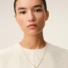 Collier avec pendentif « 2 » martelé en laiton doré