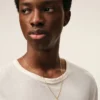 Collier avec pendentif « 3 » martelé en laiton doré