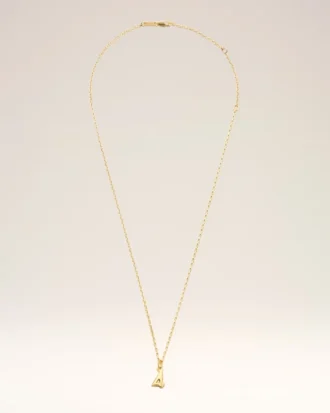 Collier avec pendentif « 4 » en laiton martelé doré