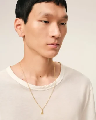 Collier avec pendentif « 4 » en laiton martelé doré