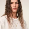Collier avec pendentif « 7 » martelé en laiton doré