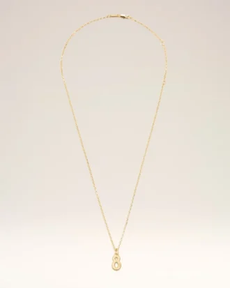 Collier avec pendentif « 8 » martelé en laiton doré