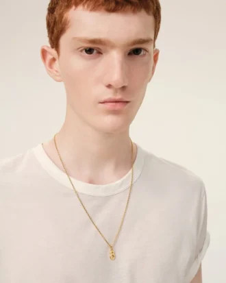 Collier avec pendentif « 8 » martelé en laiton doré