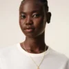 Collier avec pendentif « 8 » martelé en laiton doré