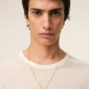 Collier avec pendentif « 9 » martelé en laiton doré