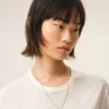 Collier avec pendentif « 9 » martelé en laiton doré