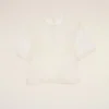 Haut court en soie blanche transparente avec sous-haut