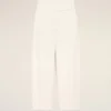 Jean blanc en coton à taille élastiquée et ceinture enveloppante, coupe ballon