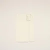 Jupe midi en laine vierge blanche avec grande boucle de ceinture