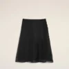 Jupe trapèze midi en soie noire transparente avec jupon