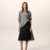 Jupe trapèze midi en soie noire transparente avec jupon