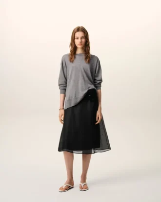 Jupe trapèze midi en soie noire transparente avec jupon