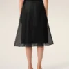 Jupe trapèze midi en soie noire transparente avec jupon