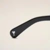 Lunettes de soleil noires 75006