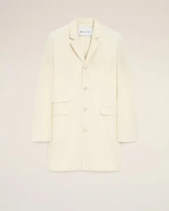 Manteau droit simple boutonnage en laine vierge blanche