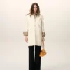 Manteau droit simple boutonnage en laine vierge blanche