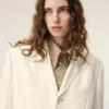 Manteau droit simple boutonnage en laine vierge blanche