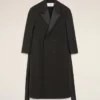 Manteau long noir en laine smockée à double boutonnage